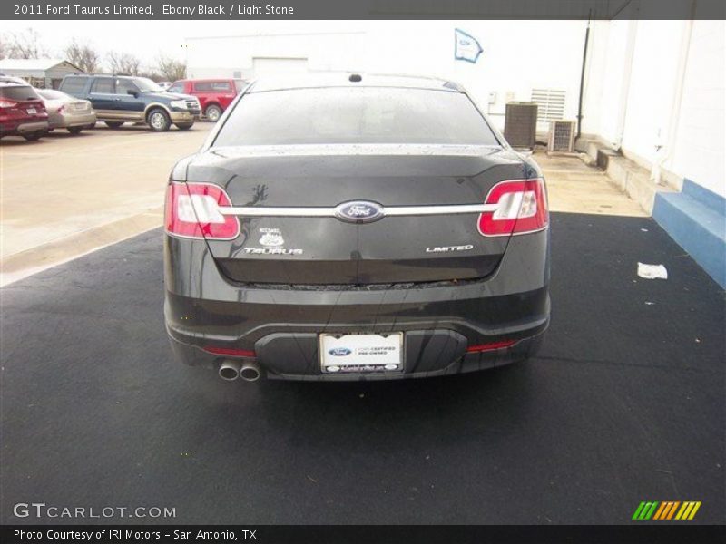 Ebony Black / Light Stone 2011 Ford Taurus Limited