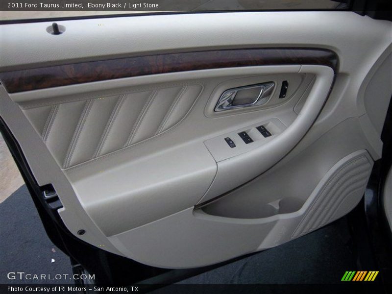 Ebony Black / Light Stone 2011 Ford Taurus Limited