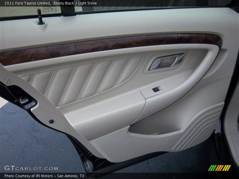 Ebony Black / Light Stone 2011 Ford Taurus Limited