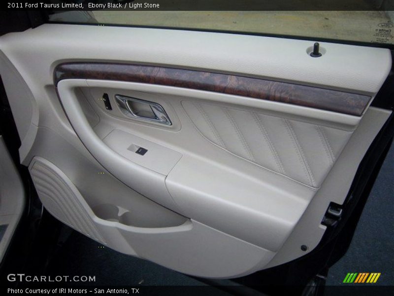 Ebony Black / Light Stone 2011 Ford Taurus Limited