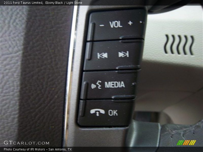 Ebony Black / Light Stone 2011 Ford Taurus Limited