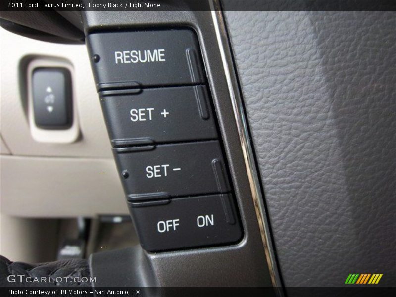 Ebony Black / Light Stone 2011 Ford Taurus Limited