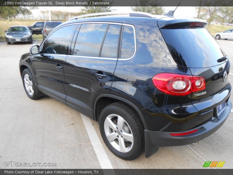 Deep Black Metallic / Sandstone 2010 Volkswagen Tiguan SE