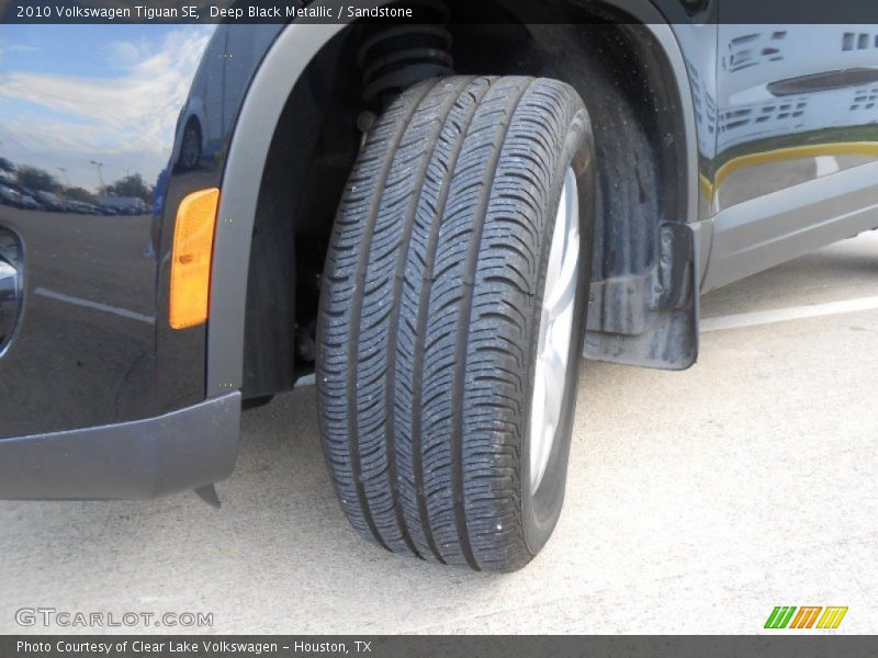 Deep Black Metallic / Sandstone 2010 Volkswagen Tiguan SE