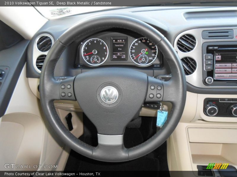 Deep Black Metallic / Sandstone 2010 Volkswagen Tiguan SE