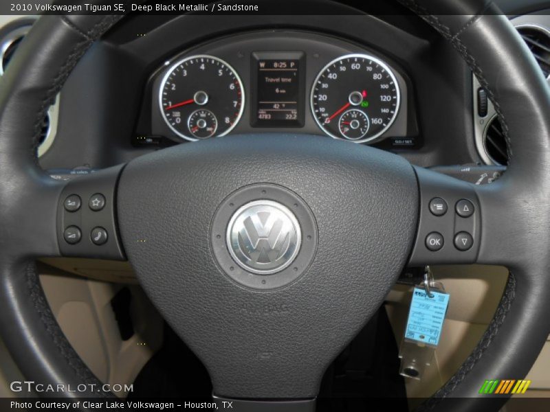 Deep Black Metallic / Sandstone 2010 Volkswagen Tiguan SE