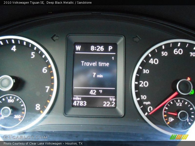Deep Black Metallic / Sandstone 2010 Volkswagen Tiguan SE