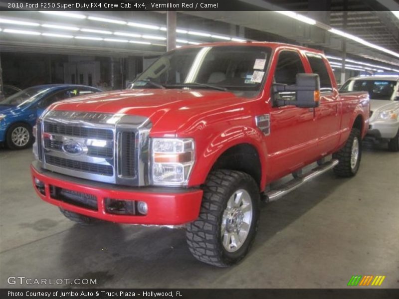 Front 3/4 View of 2010 F250 Super Duty FX4 Crew Cab 4x4