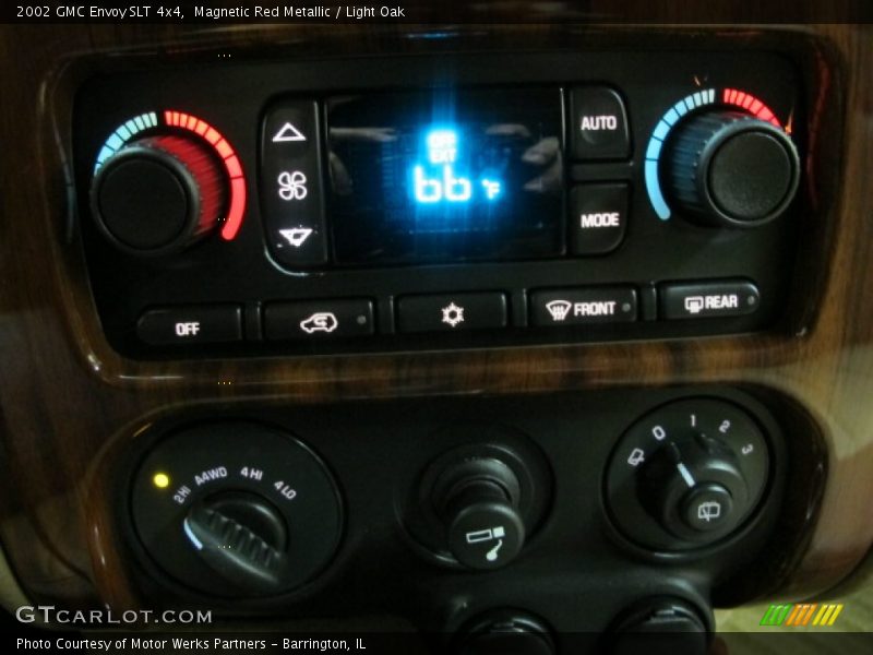 Magnetic Red Metallic / Light Oak 2002 GMC Envoy SLT 4x4