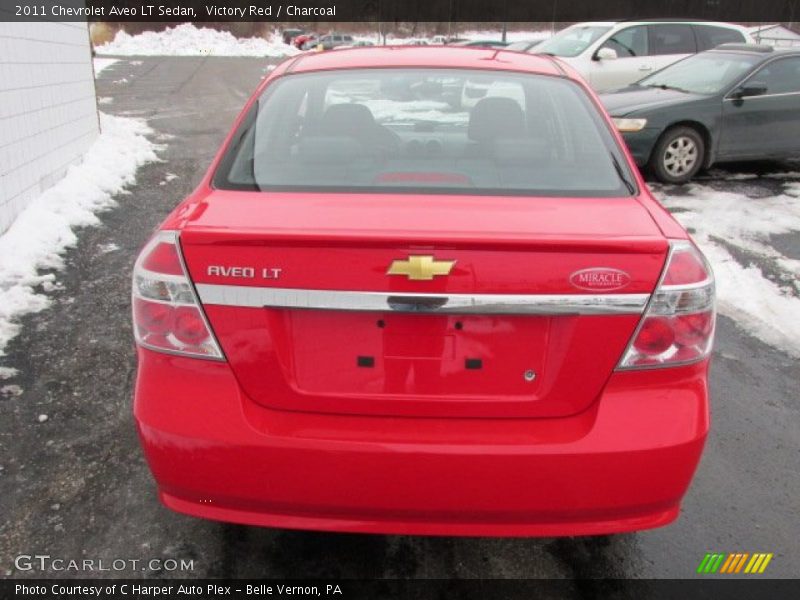 Victory Red / Charcoal 2011 Chevrolet Aveo LT Sedan