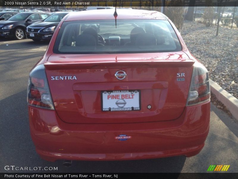 Red Alert / Charcoal 2009 Nissan Sentra 2.0 SR