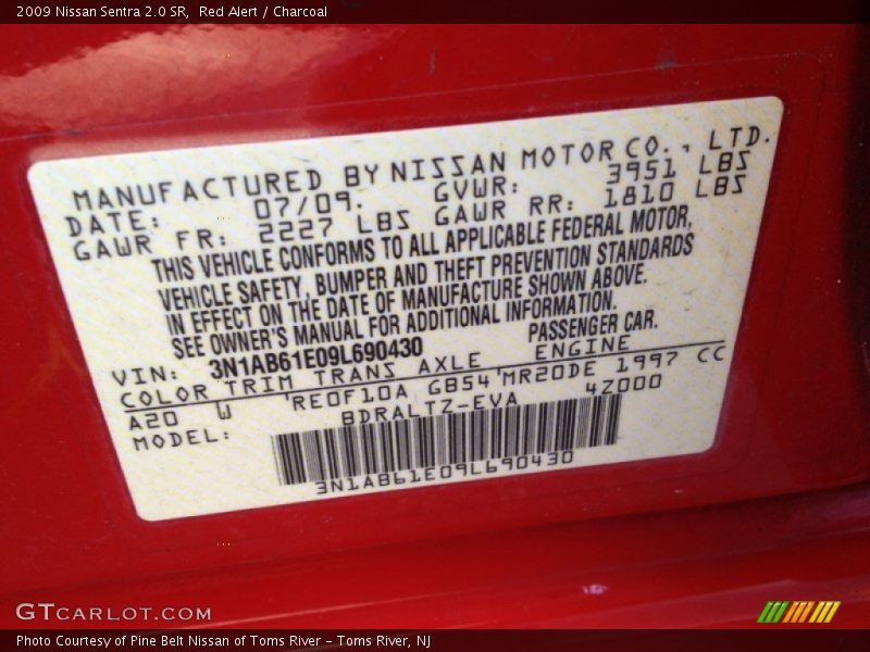 Red Alert / Charcoal 2009 Nissan Sentra 2.0 SR