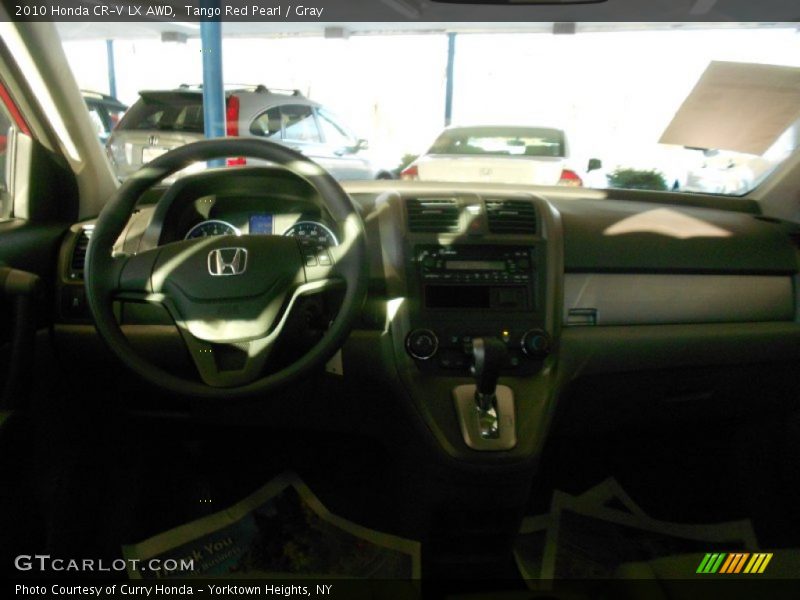 Tango Red Pearl / Gray 2010 Honda CR-V LX AWD