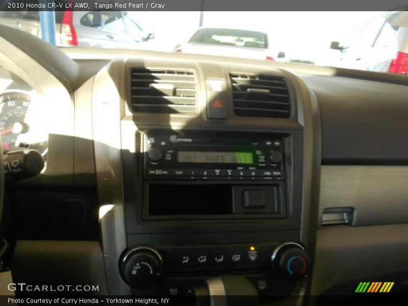 Tango Red Pearl / Gray 2010 Honda CR-V LX AWD