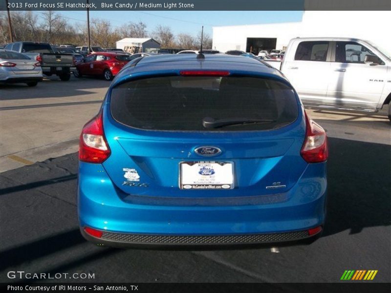 Blue Candy / Medium Light Stone 2013 Ford Focus SE Hatchback