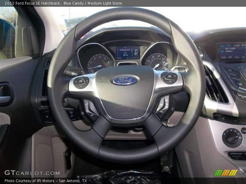 Blue Candy / Medium Light Stone 2013 Ford Focus SE Hatchback