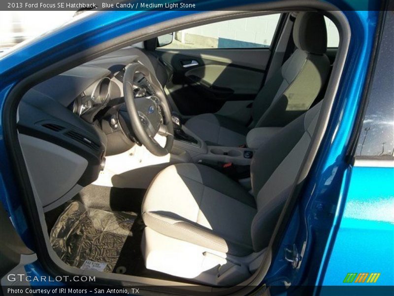 Blue Candy / Medium Light Stone 2013 Ford Focus SE Hatchback