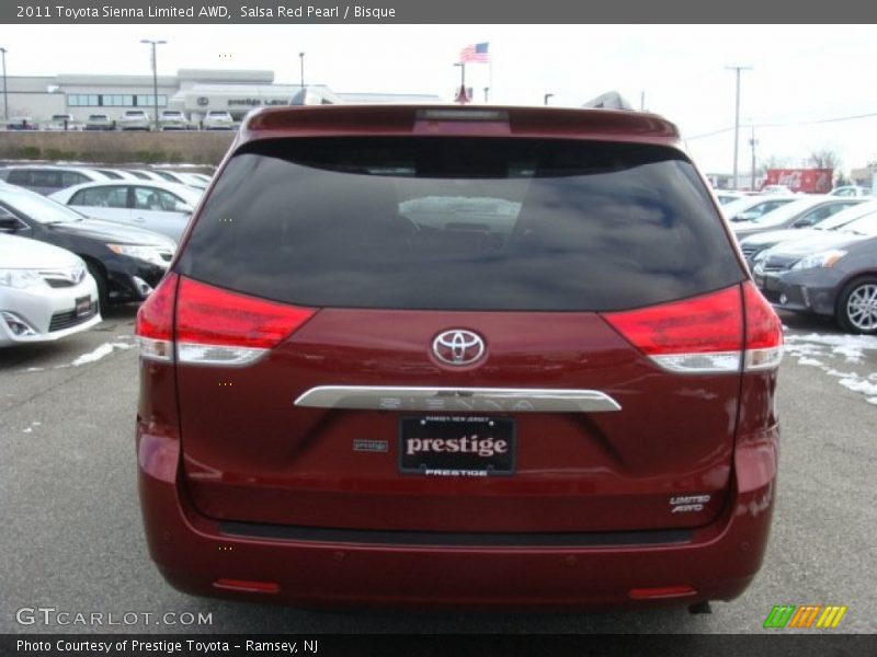 Salsa Red Pearl / Bisque 2011 Toyota Sienna Limited AWD
