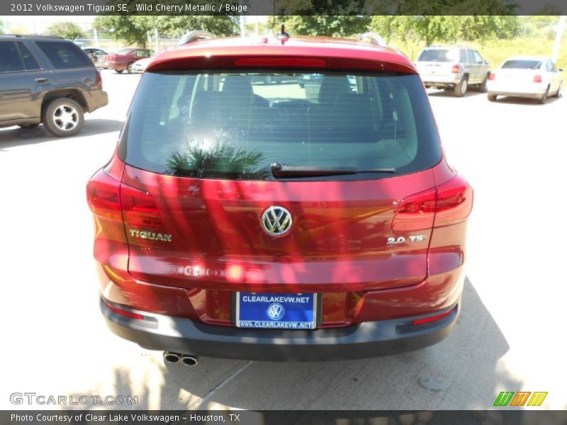 Wild Cherry Metallic / Beige 2012 Volkswagen Tiguan SE