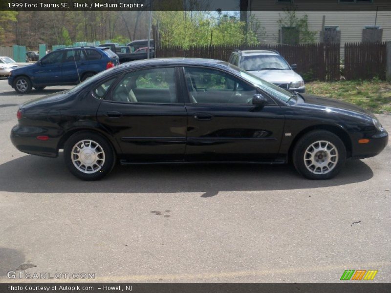 Black / Medium Graphite 1999 Ford Taurus SE