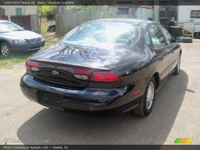 Black / Medium Graphite 1999 Ford Taurus SE