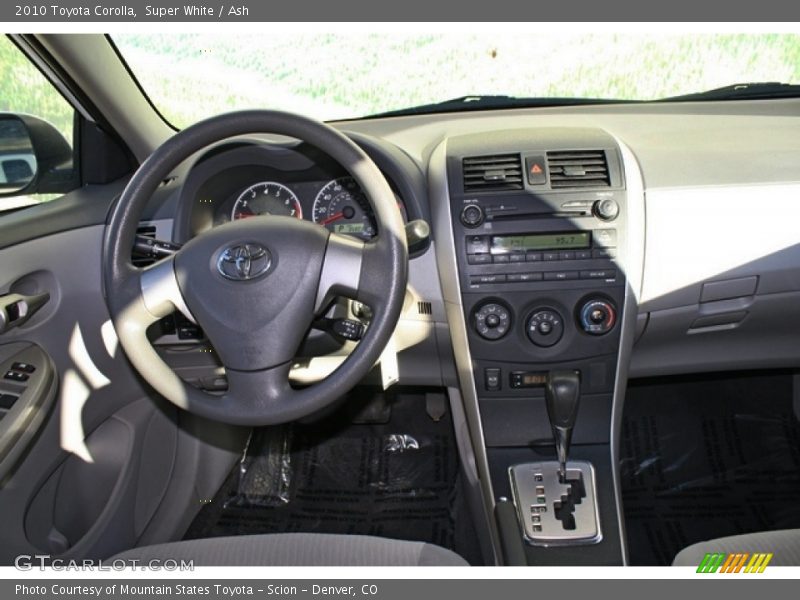 Super White / Ash 2010 Toyota Corolla