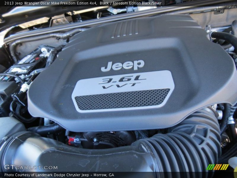 Black / Freedom Edition Black/Silver 2013 Jeep Wrangler Oscar Mike Freedom Edition 4x4