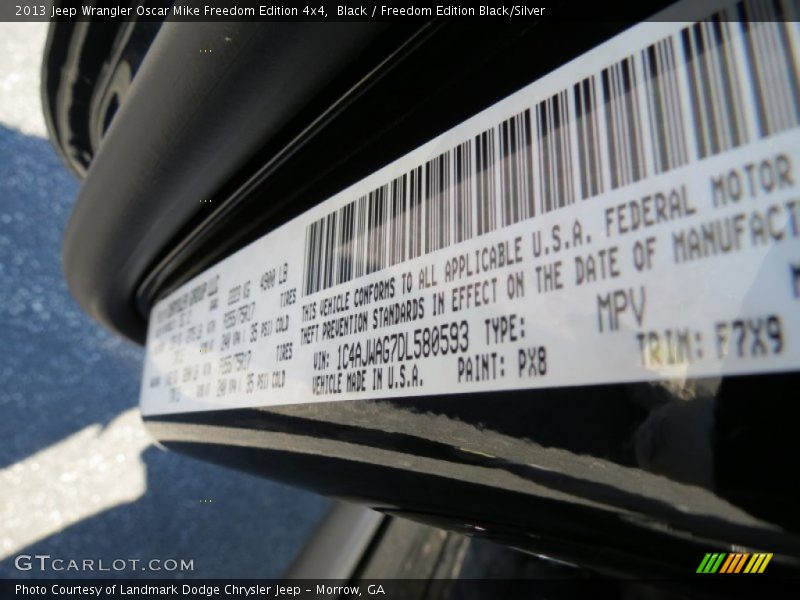 Black / Freedom Edition Black/Silver 2013 Jeep Wrangler Oscar Mike Freedom Edition 4x4