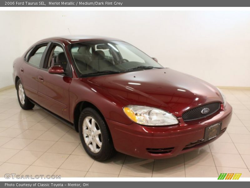 Merlot Metallic / Medium/Dark Flint Grey 2006 Ford Taurus SEL