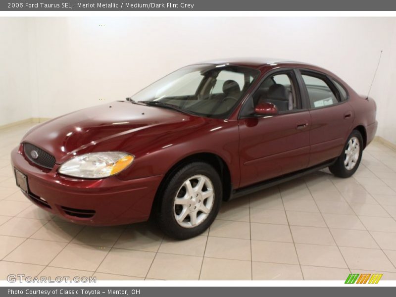 Merlot Metallic / Medium/Dark Flint Grey 2006 Ford Taurus SEL