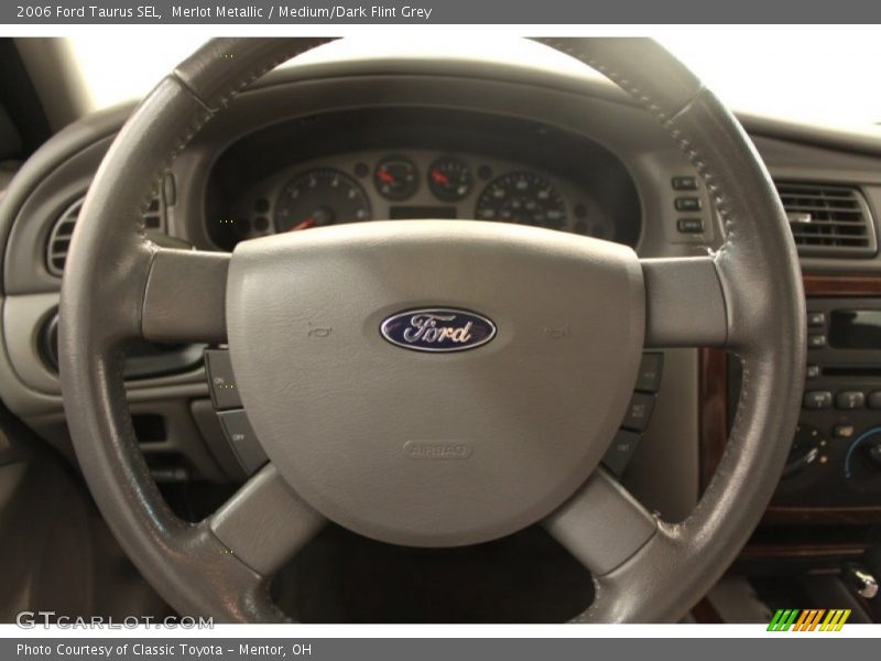 Merlot Metallic / Medium/Dark Flint Grey 2006 Ford Taurus SEL