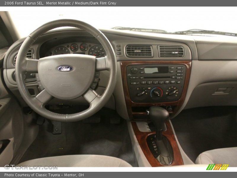 Merlot Metallic / Medium/Dark Flint Grey 2006 Ford Taurus SEL