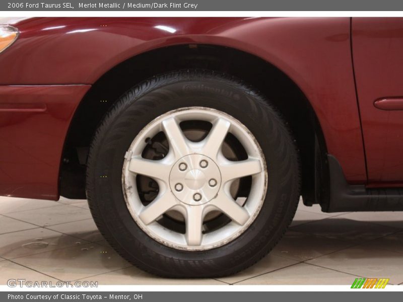 Merlot Metallic / Medium/Dark Flint Grey 2006 Ford Taurus SEL