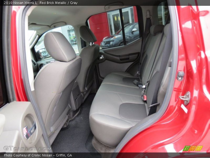 Red Brick Metallic / Gray 2010 Nissan Xterra S