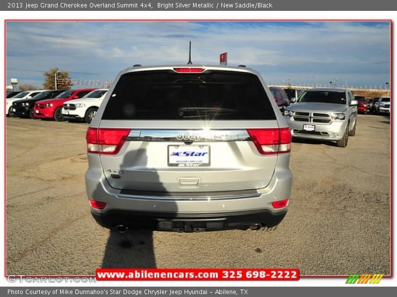 Bright Silver Metallic / New Saddle/Black 2013 Jeep Grand Cherokee Overland Summit 4x4