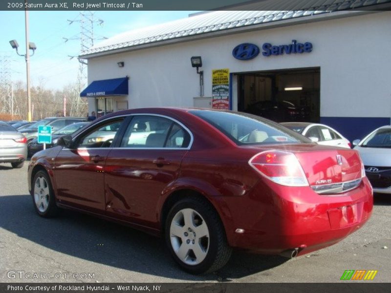 Red Jewel Tintcoat / Tan 2009 Saturn Aura XE