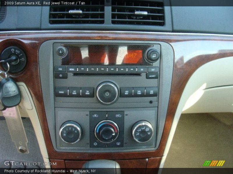 Red Jewel Tintcoat / Tan 2009 Saturn Aura XE