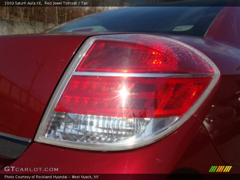 Red Jewel Tintcoat / Tan 2009 Saturn Aura XE