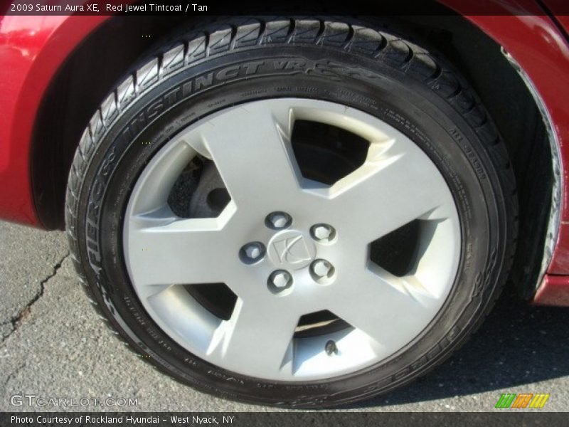 Red Jewel Tintcoat / Tan 2009 Saturn Aura XE