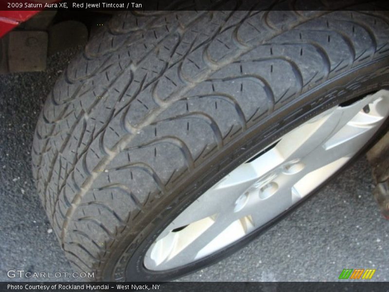 Red Jewel Tintcoat / Tan 2009 Saturn Aura XE