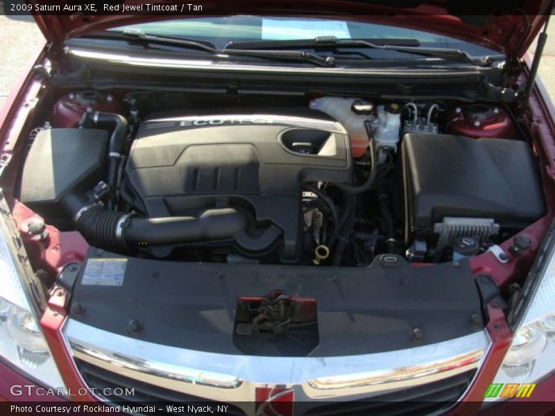 Red Jewel Tintcoat / Tan 2009 Saturn Aura XE