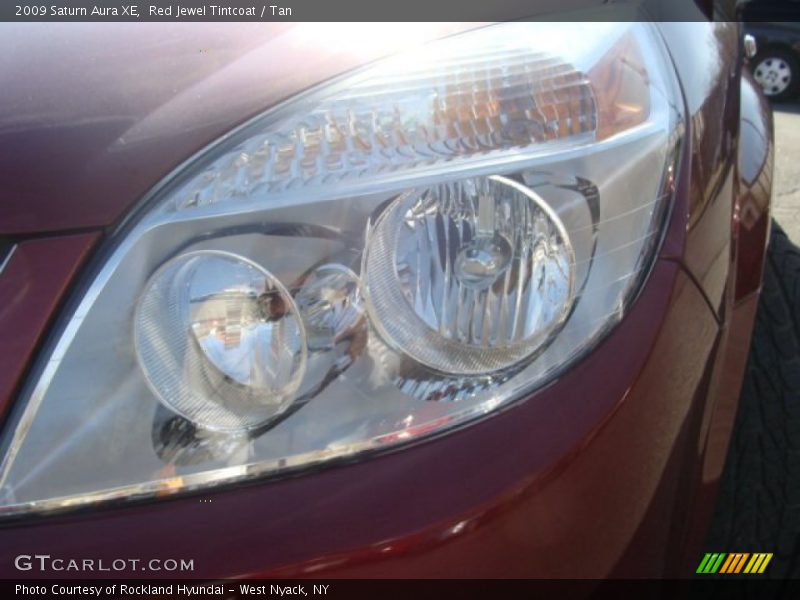 Red Jewel Tintcoat / Tan 2009 Saturn Aura XE