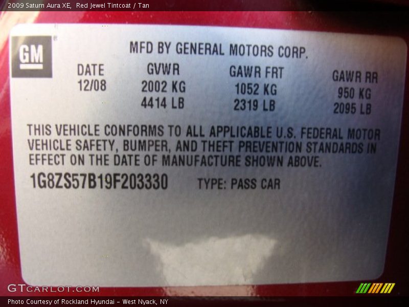 Red Jewel Tintcoat / Tan 2009 Saturn Aura XE