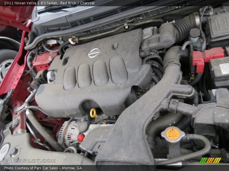 Red Brick / Charcoal 2011 Nissan Versa 1.8 S Sedan