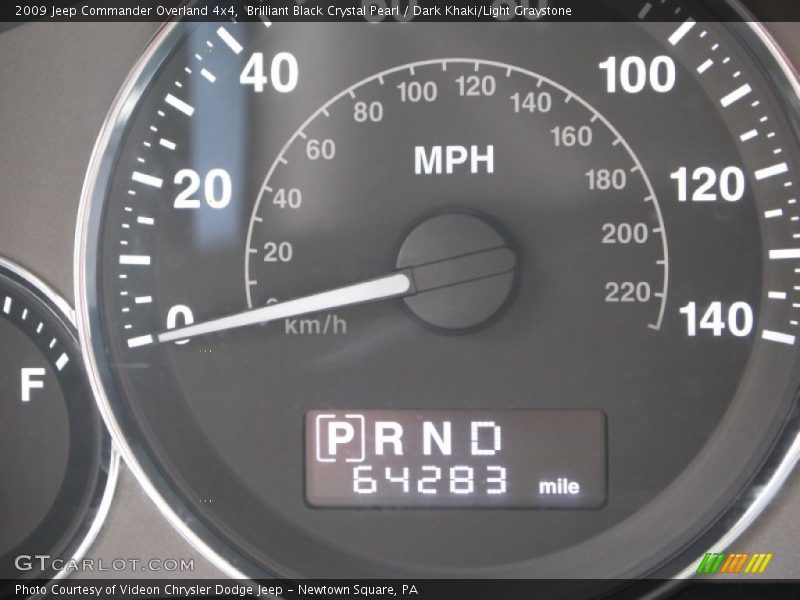 Brilliant Black Crystal Pearl / Dark Khaki/Light Graystone 2009 Jeep Commander Overland 4x4