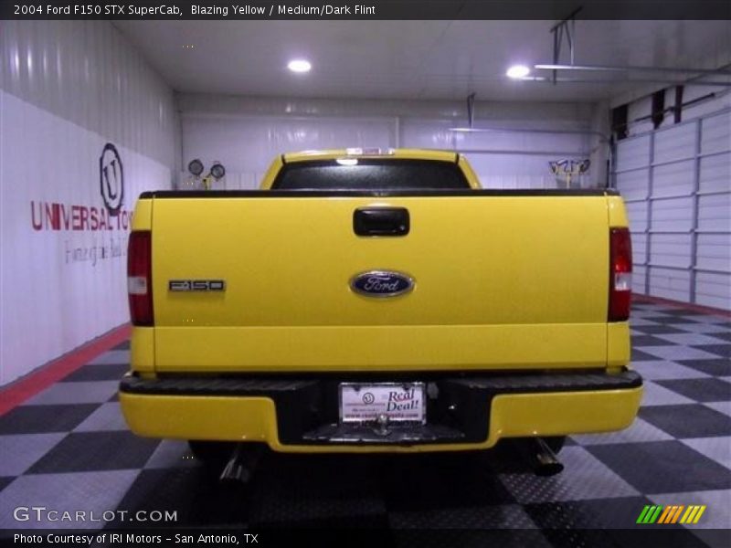 Blazing Yellow / Medium/Dark Flint 2004 Ford F150 STX SuperCab