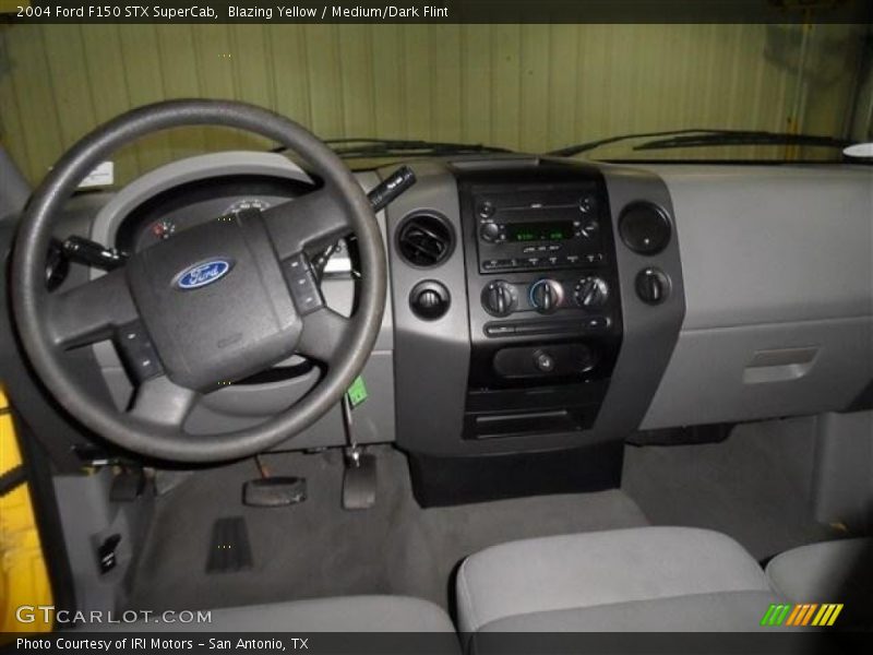 Blazing Yellow / Medium/Dark Flint 2004 Ford F150 STX SuperCab