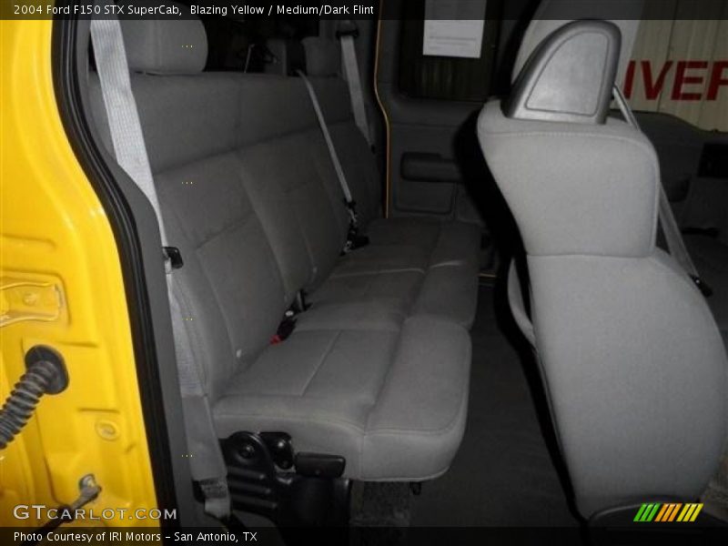 Blazing Yellow / Medium/Dark Flint 2004 Ford F150 STX SuperCab