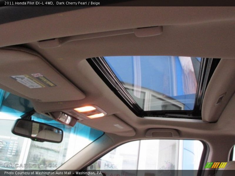 Dark Cherry Pearl / Beige 2011 Honda Pilot EX-L 4WD