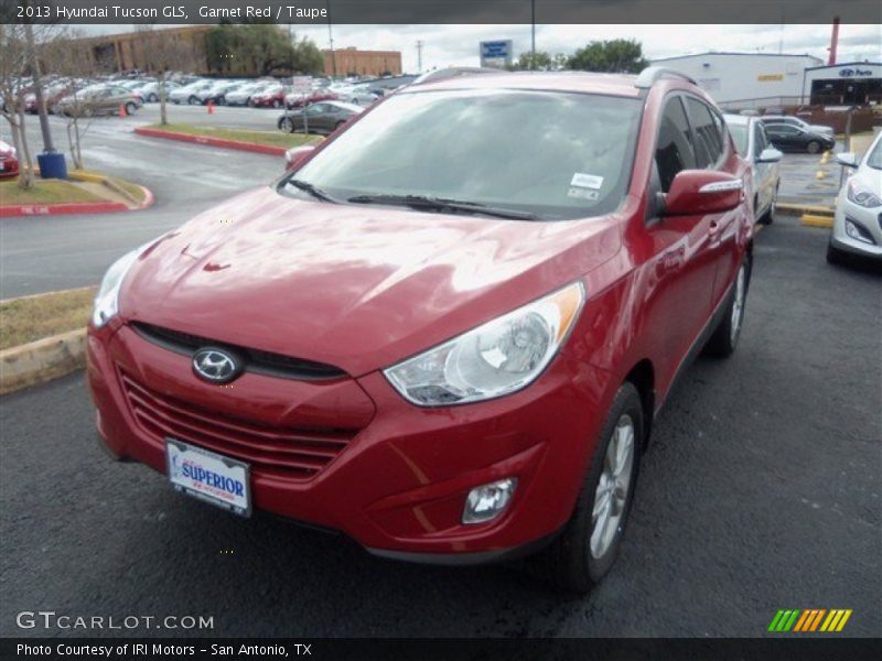 Garnet Red / Taupe 2013 Hyundai Tucson GLS